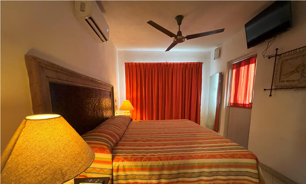 Suite 2 habitaciones con cocineta frente al mar - Una cama King Size